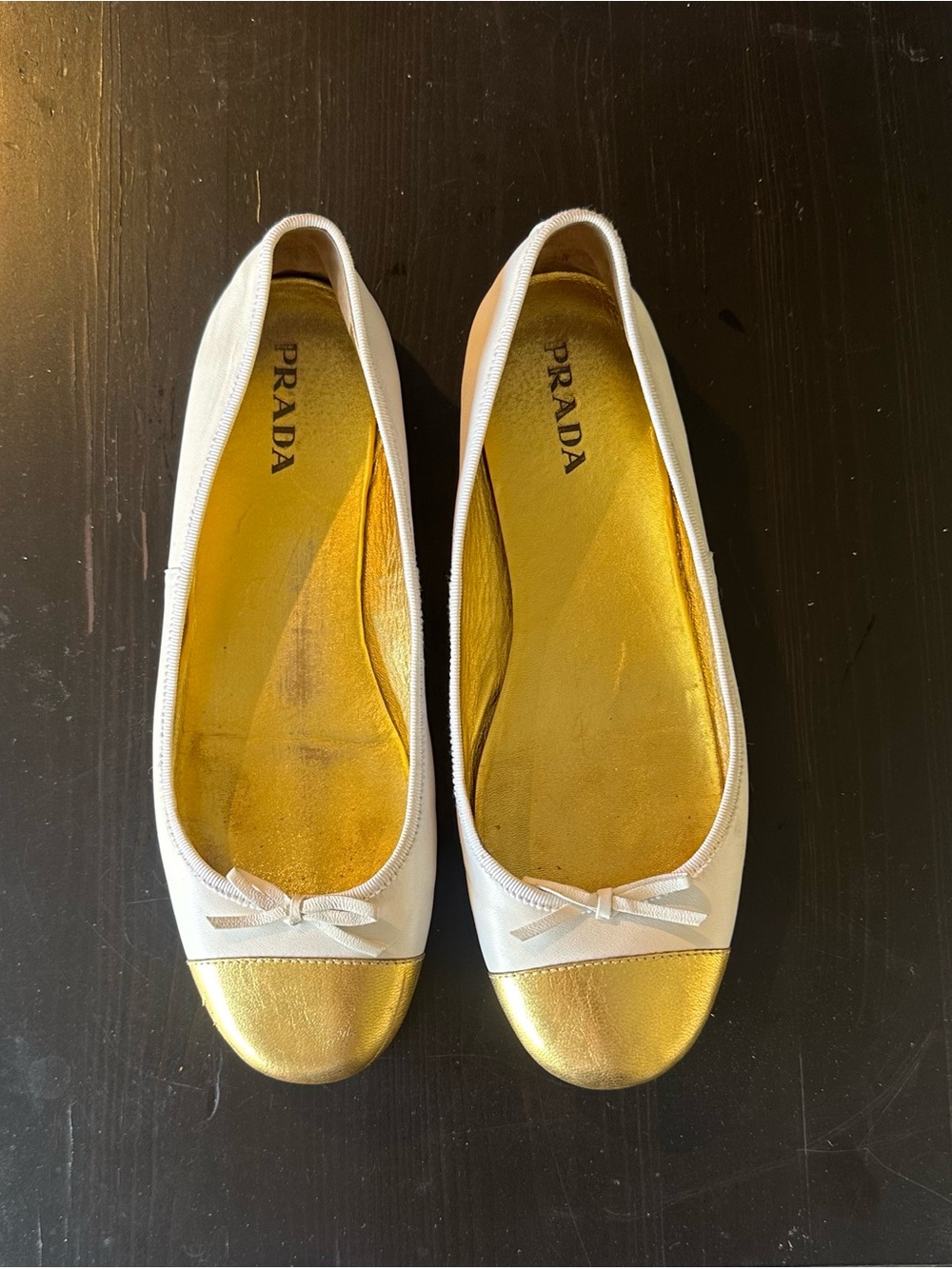 Prada White Leather Ballet Flats with Gold Cap Toe